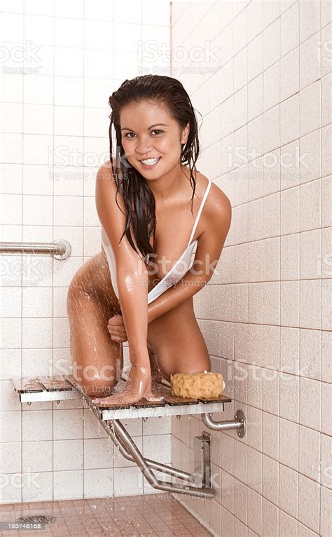 Beautiful Ethnic Hawaiian Young Woman Takes Shower Stock