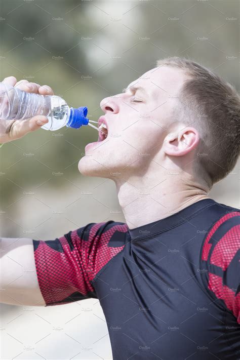 Male Runner Drinking Water High Quality Sports Stock Photos