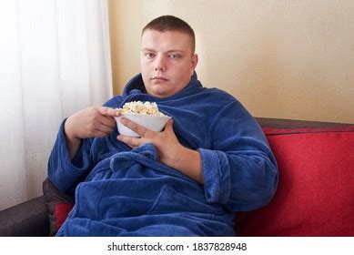 Fat Man Robe Eating Popcorn While Stock Photo 1837828948 Shutterstock