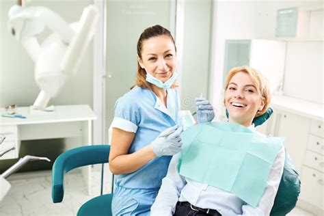 Dentist And Patient Girl Are Smiling Stock Image Image Of Dentist