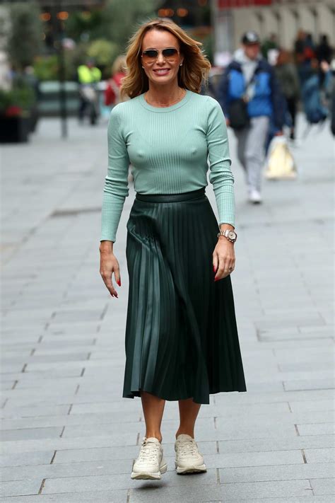 Amanda Holden Wears A Mint Green Top And Dark Green Skirt As She Leaves