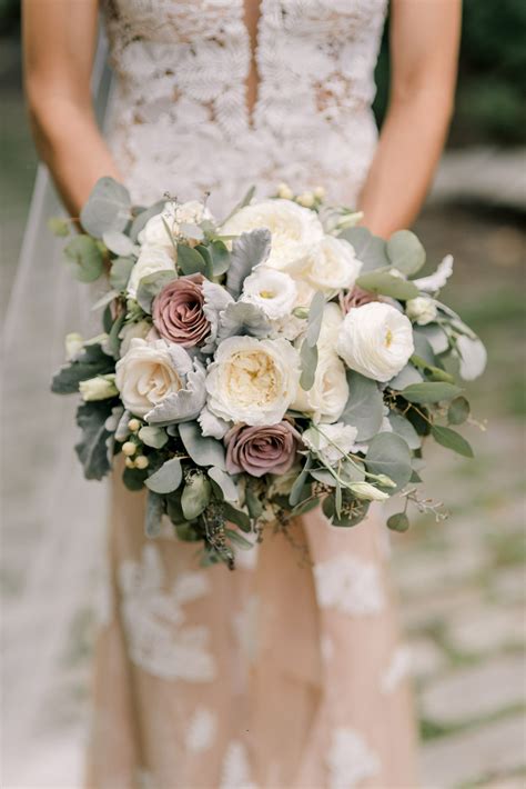 Elegant Vintage Bouquet Of White And Mauve Roses And Eucalyptus Leaves