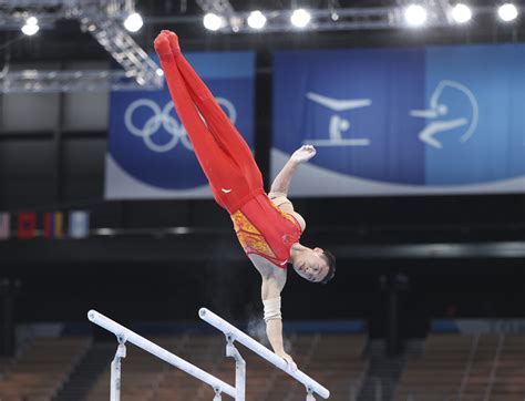 Chinese Gymnast Zou Claims Mens Parallel Bars Title At Tokyo Olympics