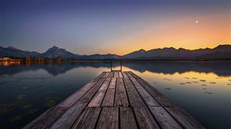 2560x1440 Resolution Lake Pier And Mountain Sunset 1440p Resolution