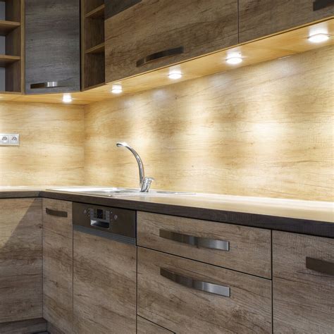 The first method is to install the led strip on the lip or trim of the cabinet so the leds face the backsplash. 5 Types of Under Cabinet Lighting: Pros & Cons — 1000Bulbs ...