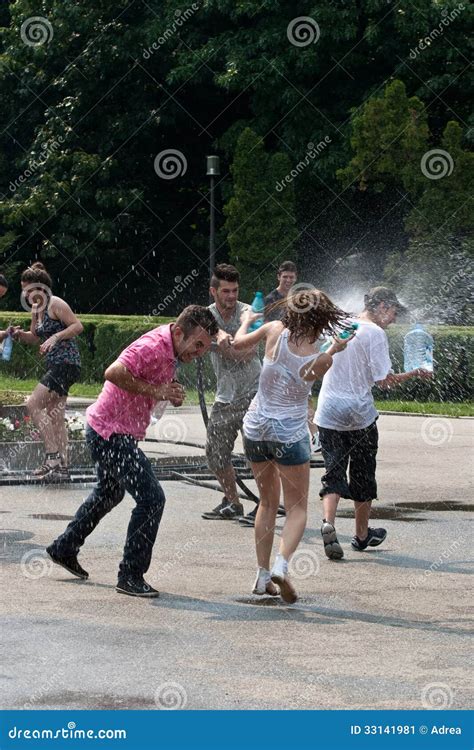 Wet Happy Teenagers At A Water Fight In Herastrau Park Editorial Photo