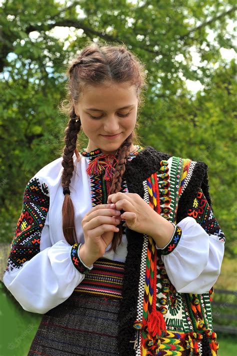 Premium Photo Ukrainian Hutsulka Girl In National Costume Braids A Braid