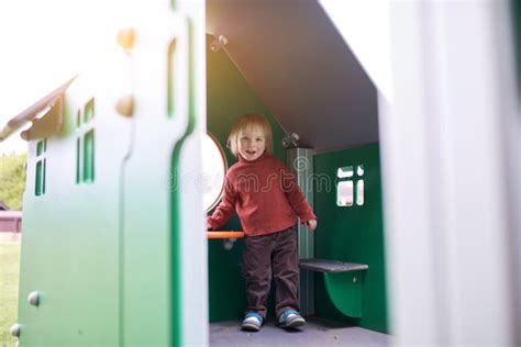Happy 2 Year Old Toddler Playing At The Playground Stock Image Image