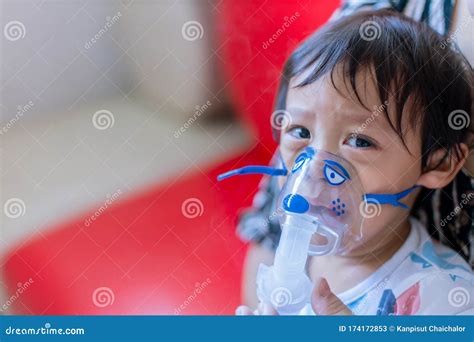 Sick Boy Inhalation Therapy By The Mask Of Inhaler Baby Has Asthma And