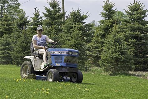 Woman Driving Lawn Mower Editorial Photo Image Of Activities 54592166