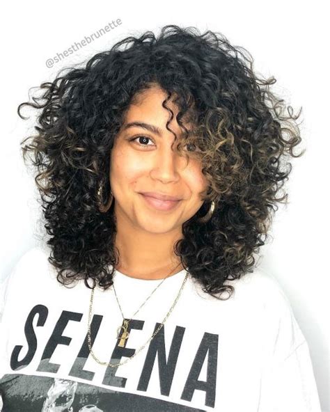 Curly girls completely understand the importance of a smart haircut choice, along with an arsenal of daily hairstyles to keep thick ringlets under control during every season. 25 Best Shoulder Length Curly Hair Cuts & Styles in 2020