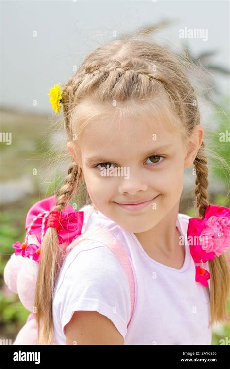 Portrait Of A Beautiful Six Year Old Girl With Blond Hair Stock Photo