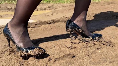 muddy stiletto pumps wet and muddy high heels high heels stuck in mud wet high heels 1082