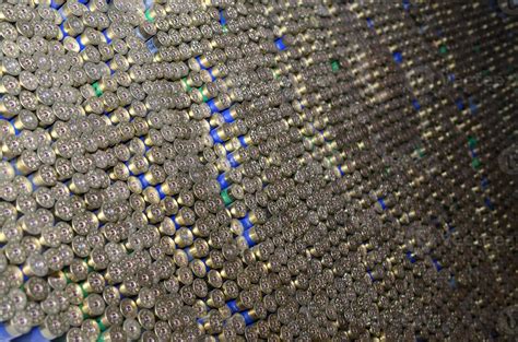 Pattern of 12 gauge cartridges for shotgun bullets. Shells for hunting