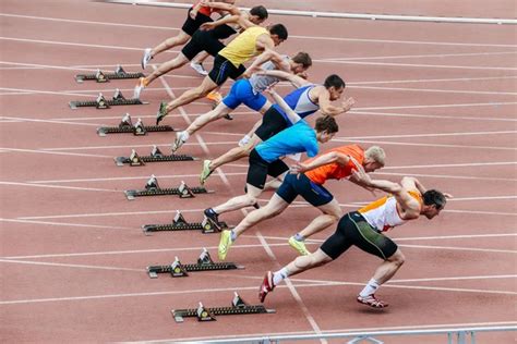 Start Men Athletes At Sprint Distance Of 100 Meters Stock Image