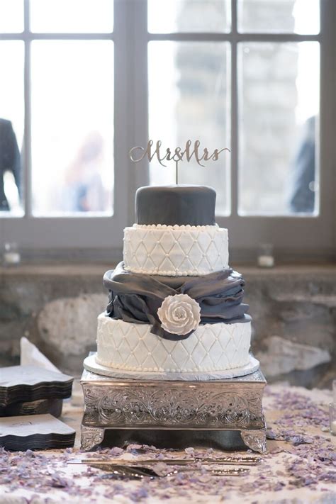 Four Tier Gray And White Wedding Cake With Topper