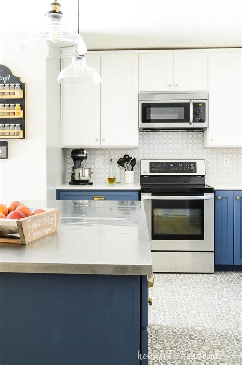 Some hot color selections for two tone color kitchen cabinets are dark neutral hues like charcoal grays, blacks, taupes can be combined with warm nature influenced hues such as terra cotta, sage greens or mustard yellow. Blue & White Two Tone Kitchen Reveal (With images) | Kitchen renovation, Kitchen remodel ...