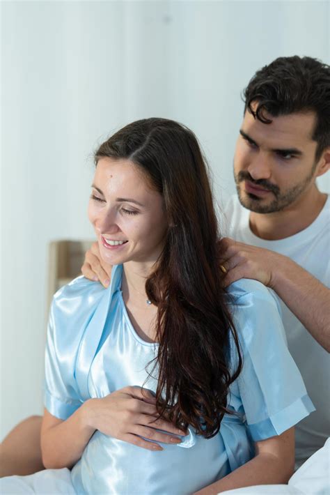 Husband Giving A Pregnant Wife A Massage So That The Wife Can Relax And Have A Good Mood 6903842