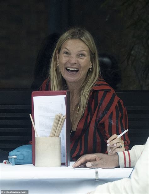 Kate Moss Puts On An Animated Display As She Enjoys Teetotal Lunch In Notting Hill With Pals