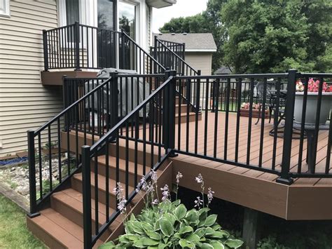 Interior and exterior railings, balconies, gates/fences, furniture, fireplace screens and accessories, chandeliers, safety guard rails, window wells, aluminum ramps, railings, and grab bars, and. Trex deck in Saddle | Deck designs backyard, Railings ...