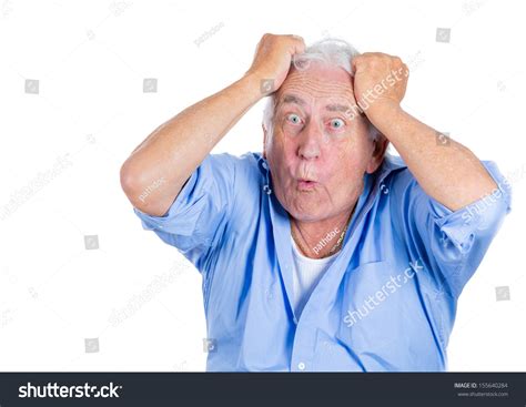 Closeup Portrait Of A Senior Man Grandfather Pulling Out His Hair