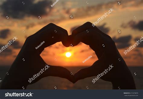 Hands Forming Heart Shape Sunset Silhouette Stock Photo Edit Now