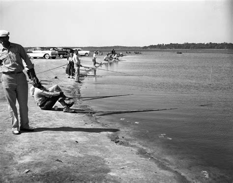This body of water covers approximately 4,000 acres of surface area which has a maximum depth of 30 feet and an average depth around 7 feet. File:Fishing at Lake Jackson near Tallahassee, Florida ...
