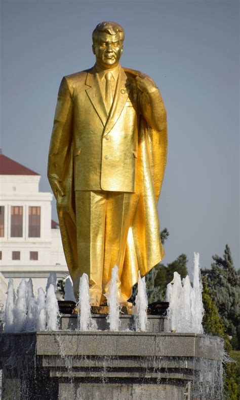 Turkmenistan A Gold Statue Of Turkmenbashi Wearing A Cloak In Ashgabat