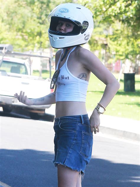 Miley Cyrus Braless And Bare Midriff Easy Rider