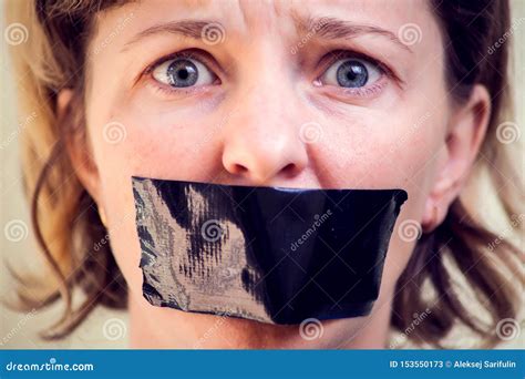 Upset Girl With Self Adhesive Tape Over Her Mouth Kidnapping Concept