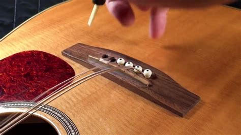 Yes, it happens with everyone. Acoustic Guitar Bridge Pin Removal Tool - YouTube