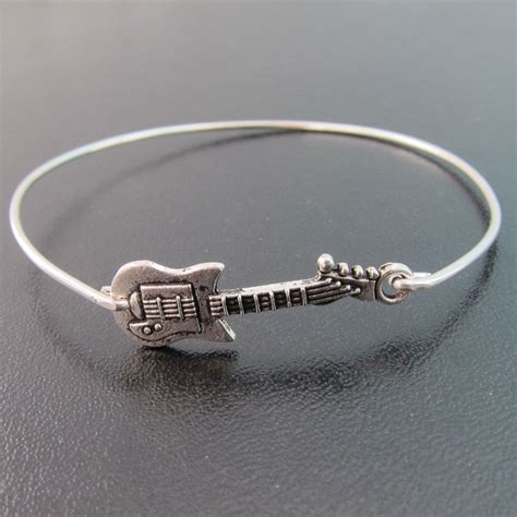 Maybe you would like to learn more about one of these? Guitar Bracelet for Women Guitar Jewelry Guitar Gift Idea ...