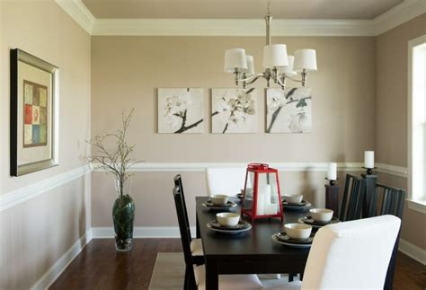 A chair rail, which sits much lower on the walls, typically has a much slimmer profile and doesn't extend as far from the wall as crown molding. Formal dining room with crown molding and chair rail ...