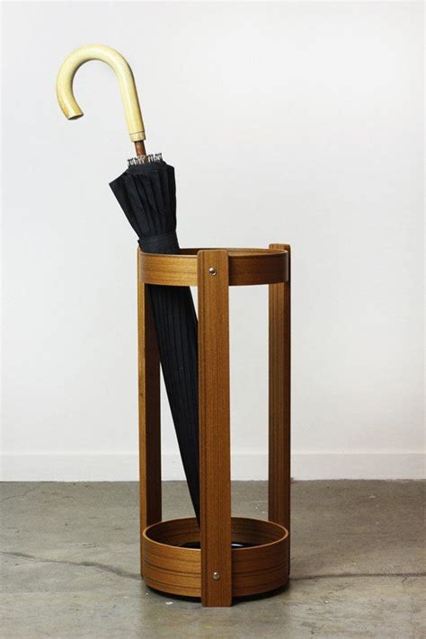 Wsj reporter anjali athavaley visits a wind tunnel and speaks with two years ago, umbrella designers figured out how to make a golf umbrella stronger through vented canopies—where one canopy sits. Wooden Umbrella Stand Teak W21cm x D21cm x H48cm