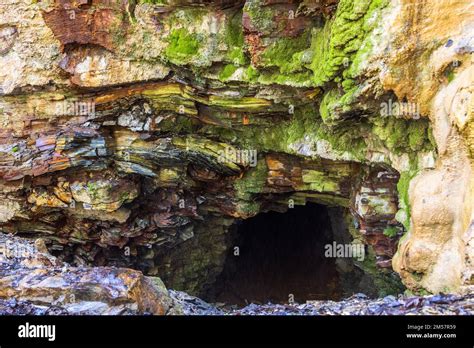 Rock Face With A Entrance To A Mineshaft Stock Photo Alamy