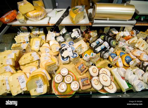 Cheese On Display In French Supermarket Stock Photo Alamy