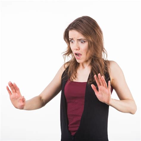 Portrait Of Scared Woman Raising Hands Up In Defense Photo Free Download