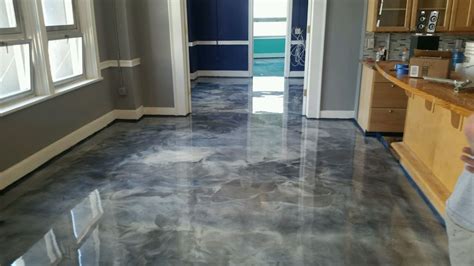 The best solution that we have found is for the property owner to employ an outdoor grade epoxy paint to cover the slip area. Metallic Epoxy Garage Flooring in Detroit Michigan Area