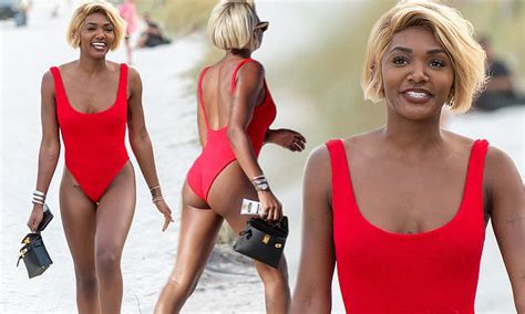 Magic Johnsons Daughter Elisa Pours Her Curves Into Red One Piece