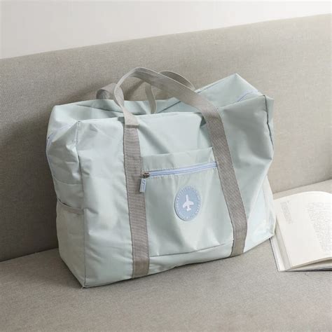 Fashion Waterproof Travel Bag Large Capacity Bag Women Nylon Folding Bag Unisex Luggage Travel