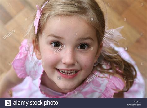 Young Girl Smiling Looking Up Beautiful Child Brown Blonde Girl Stock