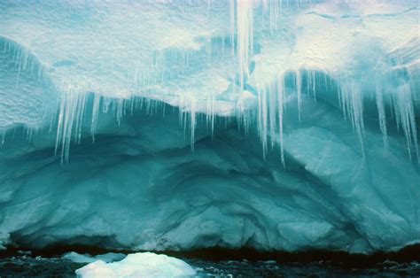 Icicles And Cave On A Coastal Ice Cliff Photograph By Simon Fraser