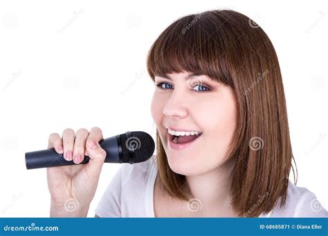 Portrait Of Young Beautiful Woman Singing With Microphone Isolated On