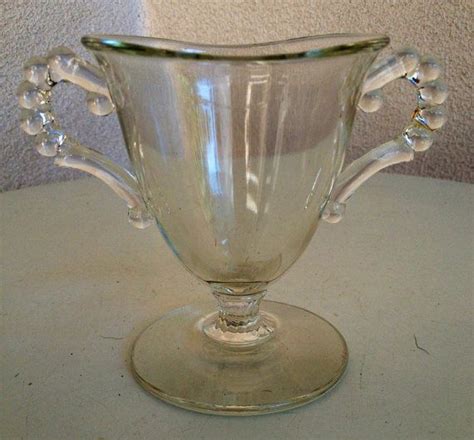 Ideal for displaying cakes, pies, cookies, or fresh fruit, this platter will provide a. Vtg Boopie Anchor Hocking glasss small cup two bead ...
