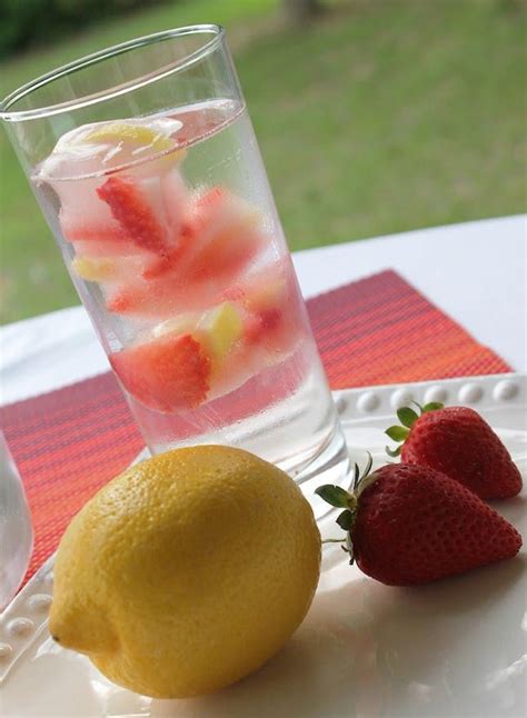 13 Ways To Upgrade Your Ice Cubes Brit Co Strawberry Lemon Water