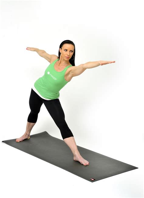 Yoga Instructor Maeve McCaffrey Demonstrates A Triangle Pose Workout