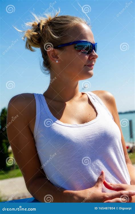 Pretty Girl With Sunglasses In Summertime In A Sunny Day Stock Photo