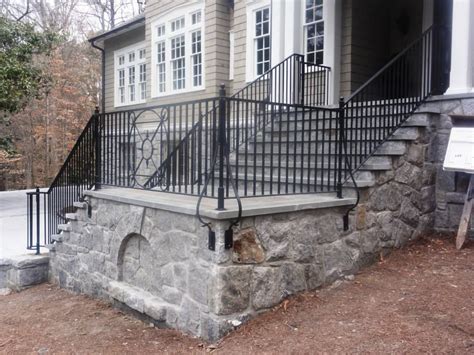 Open riser exterior steel exit stair with bar grating landing and treads. Custom Made Exterior Steel Handrail by Mill & Forge | CustomMade.com