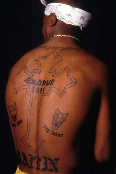 Cross tattoo designs are those little gem of religious tattoos that people love to have on their skin. Tupac's Tattoos Are So Famous, But Why? Meanings behind ...