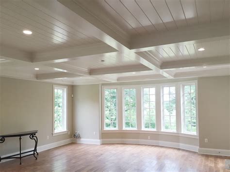 Tray ceilings are often used when there is a second floor above or to define a particular space. Coffered Ceiling with V-Groove - WindsorONE